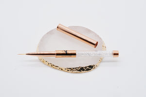 Rose gold liner brush